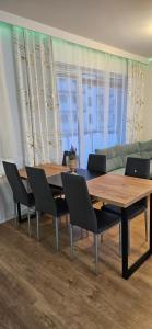 Posezení v ubytování Apartament KRYSTIAN + 11 fotografií