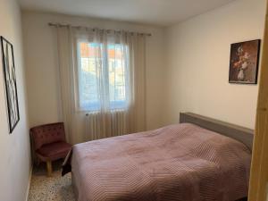 Ένα ή περισσότερα κρεβάτια σε δωμάτιο στο Appartement proche de la gare