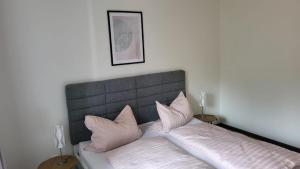 Postel nebo postele na pokoji v ubytování Ferienwohnung Gipfelblick + 7 fotografií