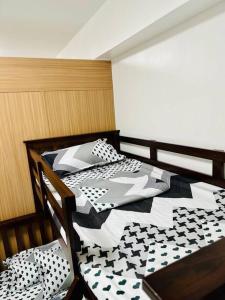 Postel nebo postele na pokoji v ubytování Makati Staycation by Marco - SMDC Lush