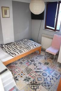 Posteľ alebo postele v izbe v ubytovaní Favela Hostel
