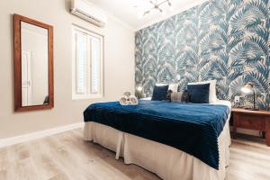 Katil atau katil-katil dalam bilik di Atelier Skalo Boutique Hotel