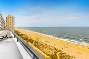 a view of the beach from the balcony of a condo at Pyramid V in Ocean City