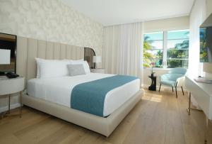 Ένα ή περισσότερα κρεβάτια σε δωμάτιο στο Avalon Hotel
