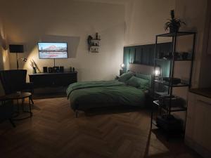 A bed or beds in a room at Stilvolles Appartment in Hagen