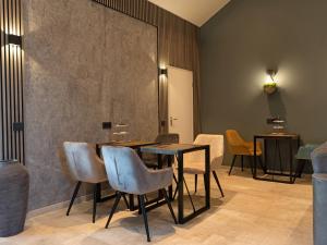Posezení v ubytování Luxe kamer met stoomsauna bij B&B Gezond aan Zee - Toegang bad en buiten Wellness tegen meerprijs