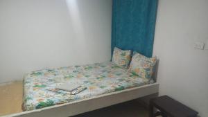 Łóżko lub łóżka w pokoju w obiekcie hotel casa del conductor doña silvia