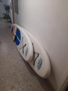 a surfboard is leaning against a wall at TETA NEDA in Omiš