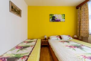 Posteľ alebo postele v izbe v ubytovaní Apartmán Palenica