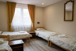 Posteľ alebo postele v izbe v ubytovaní Konaciste Pepa