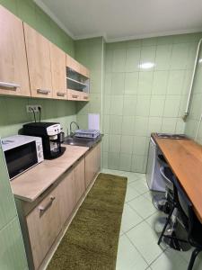 Kuchyňa alebo kuchynka v ubytovaní Agria Residence