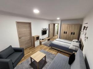 Posteľ alebo postele v izbe v ubytovaní Agria Residence