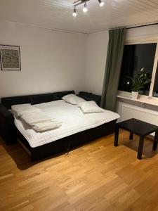 Postel nebo postele na pokoji v ubytování Villa på landet i Kulltorp