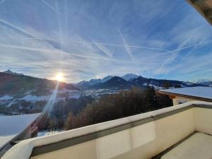 a view of the mountains from the balcony of a house at BoschBerge in Ellbögen