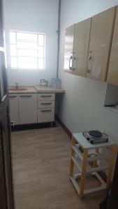 Η κουζίνα ή μικρή κουζίνα στο Casa de hóspedes 436