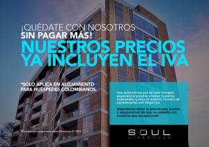 un edificio con una señal delante de él en Soul Lifestyle Hotel, en Medellín