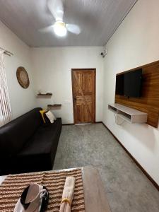 Μια τηλεόραση ή/και κέντρο ψυχαγωγίας στο Casa Cantinho de Guaiú