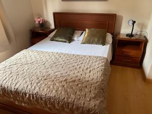 Säng eller sängar i ett rum på Flat Montebello