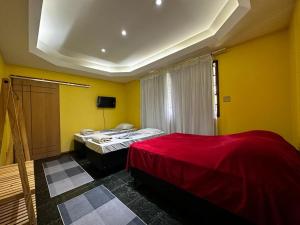 Village Hostel客房内的一张或多张床位