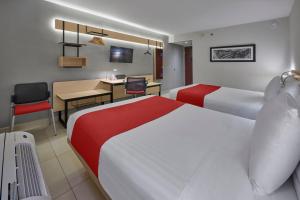 TV a/nebo společenská místnost v ubytování City Express by Marriott Cancun