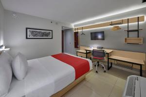 TV a/nebo společenská místnost v ubytování City Express by Marriott Cancun