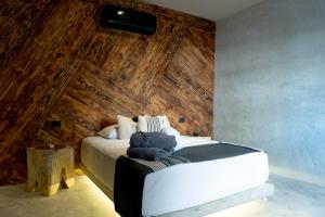 Postel nebo postele na pokoji v ubytování Hotel Macondo Estilo Holbox