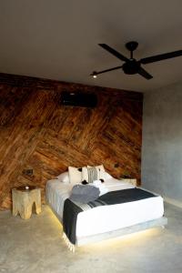 Postel nebo postele na pokoji v ubytování Hotel Macondo Estilo Holbox