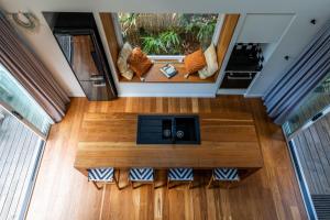 an overhead view of a living room in a tiny house at Indigo Charlee in Gold Coast