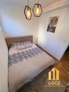 Cama o camas de una habitación en Apartman Ušće