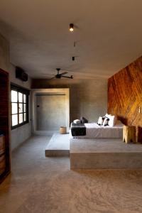 Postel nebo postele na pokoji v ubytování Hotel Macondo Estilo Holbox