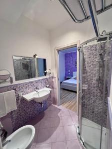 a bathroom with a sink and a shower at Bella Tropea Accommodation in Tropea +73 photos