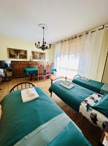 A bed or beds in a room at Affittacamere Umberto&Marisa