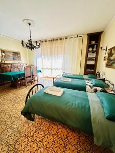 A bed or beds in a room at Affittacamere Umberto&Marisa
