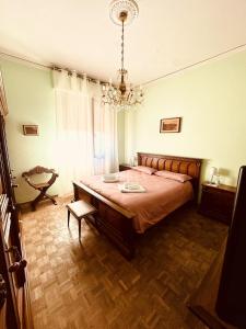 A bed or beds in a room at Affittacamere Umberto&Marisa