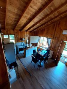 an overhead view of a kitchen and living room in a cabin at Cabaña La Terraza in Villarrica +13 photos