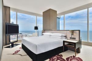 Voodi või voodid majutusasutuse Sheraton Colombo Hotel toas