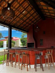 Φωτογραφία από το άλμπουμ του Casa aconchegante na rua da praia σε Κάμπο Φρίο