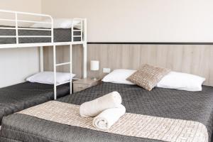 Katil atau katil-katil dalam bilik di Starline Motor Inn
