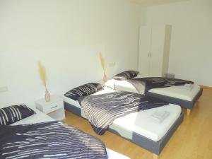 Cama ou camas em um quarto em Schöne Wohnung bis zu 6 Personen in Herzen von Rudersberg