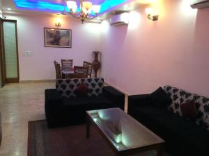 Posezení v ubytování Skylink Suites Bed & Breakfast