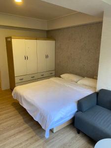 Letto o letti in una camera di Meworld Hotel - Zhongshan