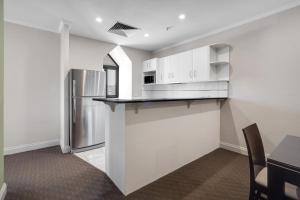 Kuchyň nebo kuchyňský kout v ubytování Frome Apartments