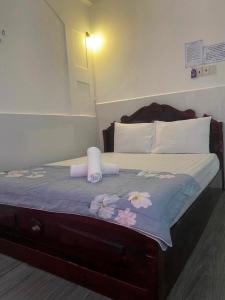 Uma cama ou camas num quarto em Thanh Hương Hotel