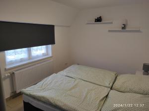 Postel nebo postele na pokoji v ubytování Pferdepension Jäger