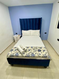 Postel nebo postele na pokoji v ubytování Casa Mango