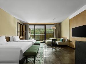 Banyan Tree Dongguan Songshan Lake 객실 침대