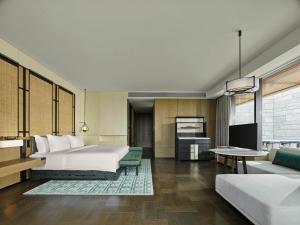 Banyan Tree Dongguan Songshan Lake 객실 침대