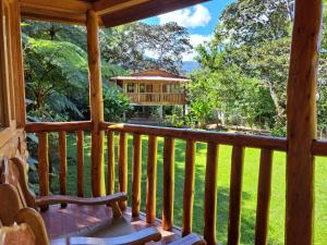 a view from the porch of a cabin at Refugio de Orquídeas in Oxapampa