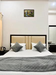 Llit o llits en una habitació de Dhaneshwari Homestay