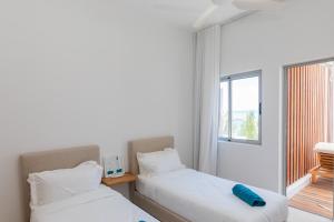 Ένα ή περισσότερα κρεβάτια σε δωμάτιο στο Modern, luxurious penthouse with incredible ocean views